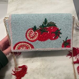 Viral beaded tomato bag